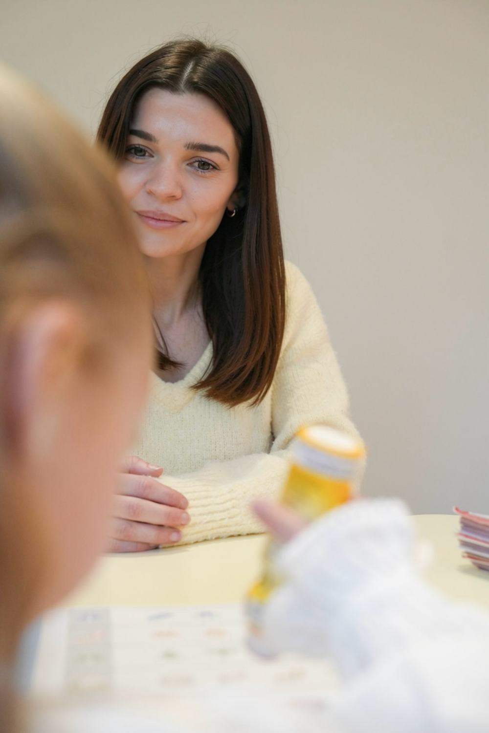 Amy Capp working one-on-one with a child at abc Child Psychology